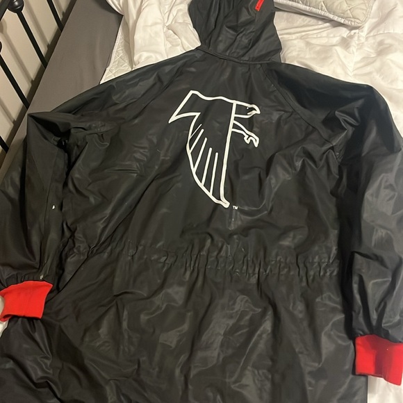NFL large Falcons raincoat with warm fleece like material on the inside. - Picture 7 of 8